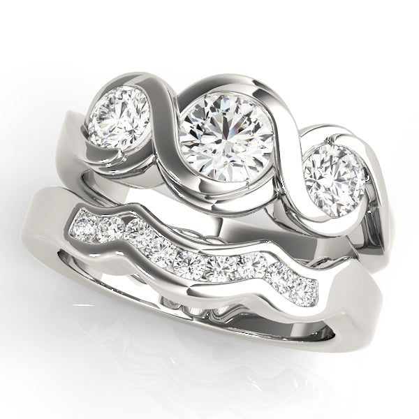 ENGAGEMENT RINGS 3 STONE ROUND